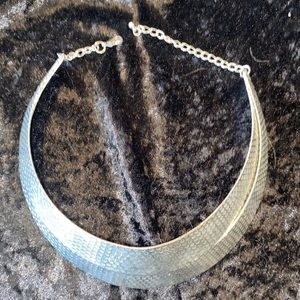 Silver bib style necklace
